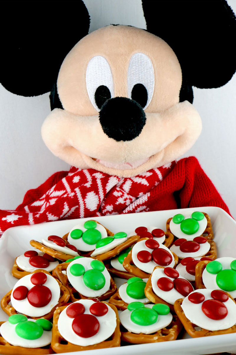 Christmas Mickey Mouse Pretzel Bites are an adorable Disney dessert that is easy to make, tastes great and is a fun sweet and salty treat for a Christmas Party.