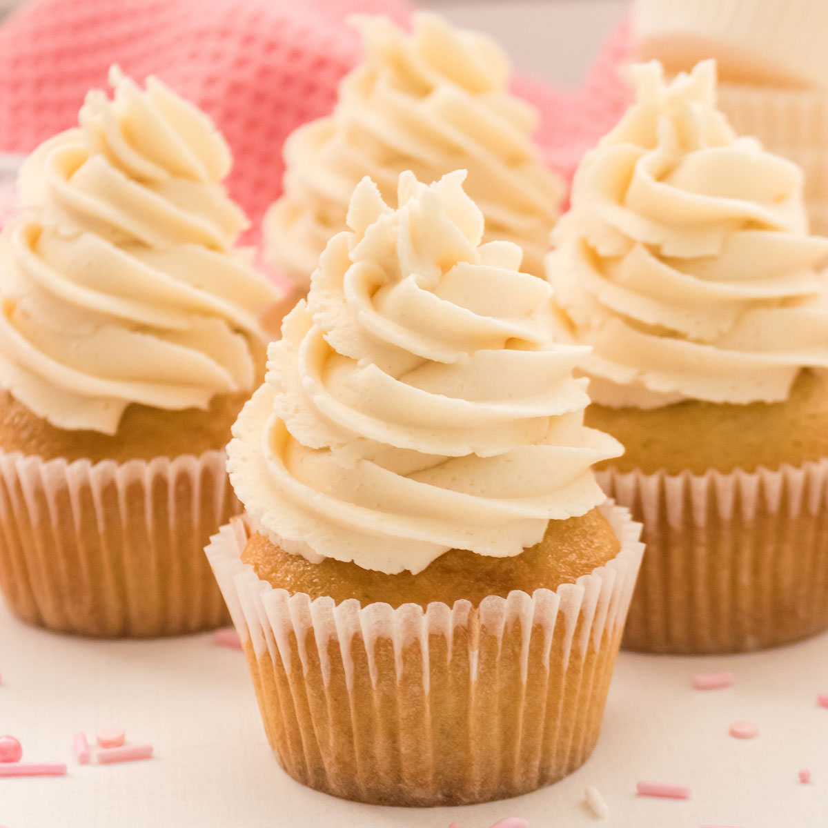 https://www.twosisterscrafting.com/wp-content/uploads/2021/03/homemade-vanilla-cupcakes-featured.jpg